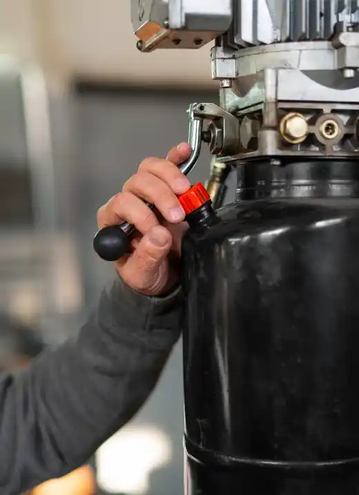 person repairing boiler